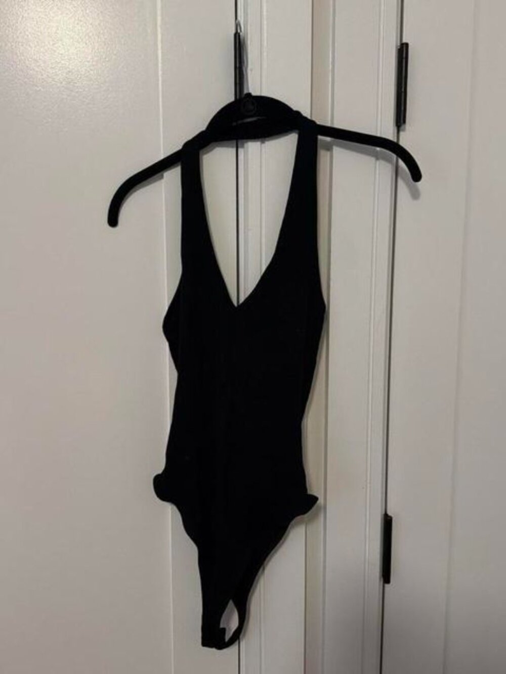 Black bodysuit with halter neck deep V neckline